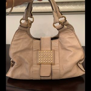 Tods leather tote with brass accents